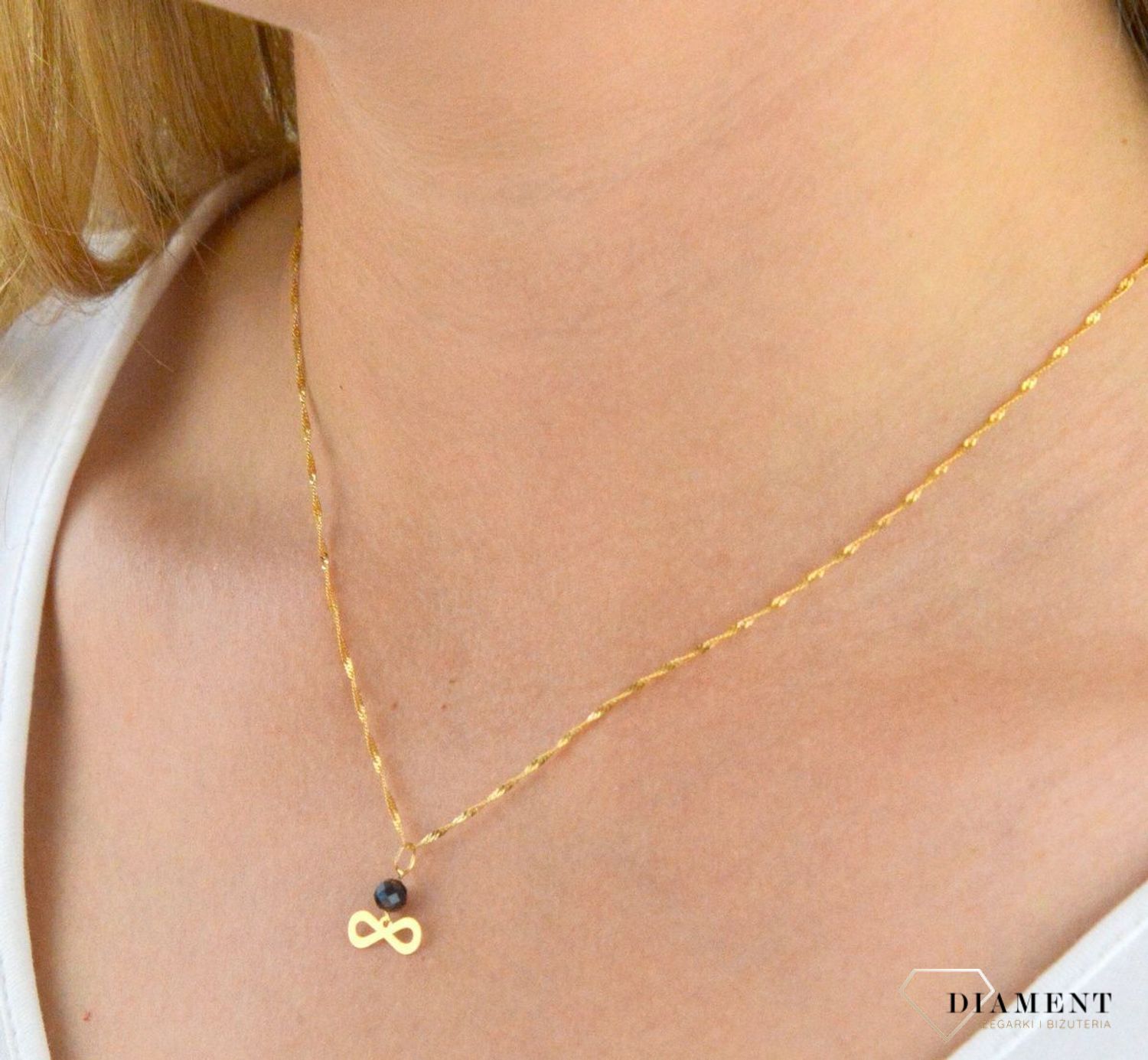 Złota zawieszka 585 nieskończoność z czarną cyrkonią ZA 4751.jpg